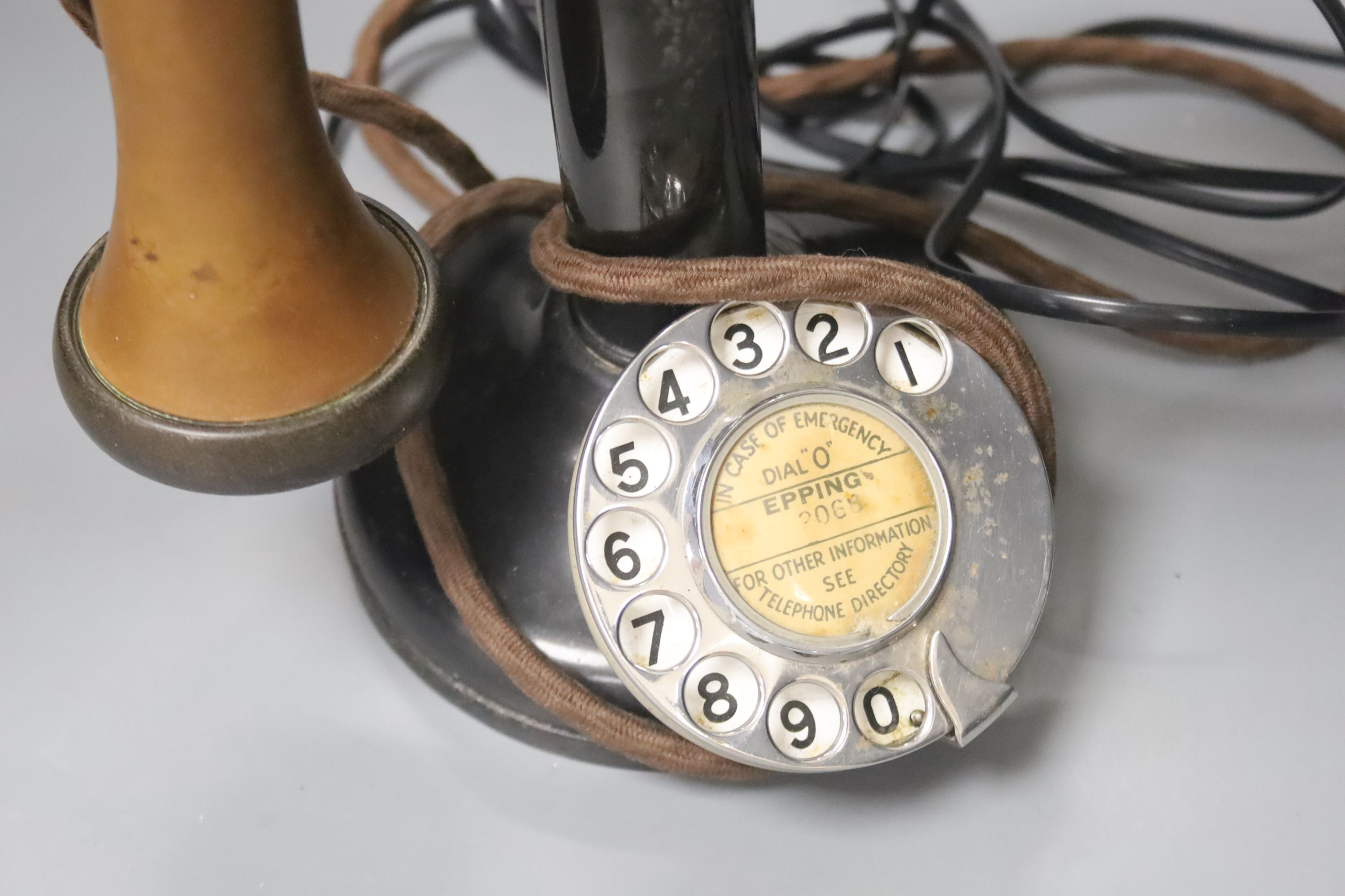 A refurbished columnar telephone, 31cm high